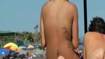 spy tattoo voyeur beach